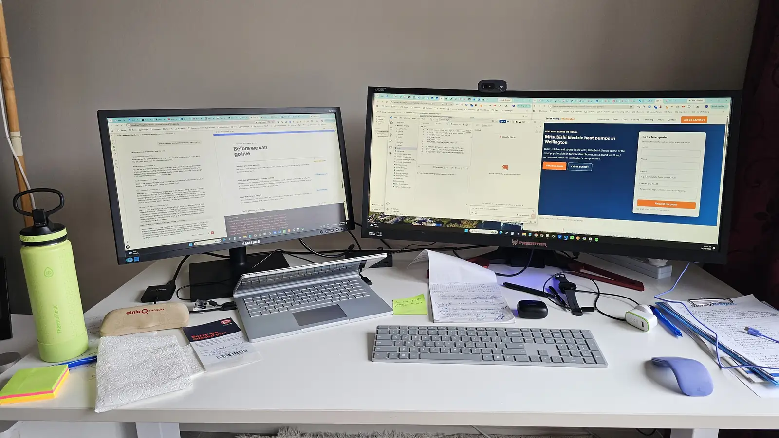 Sandra's desk: two screens, the code on the left and a client's site on the right